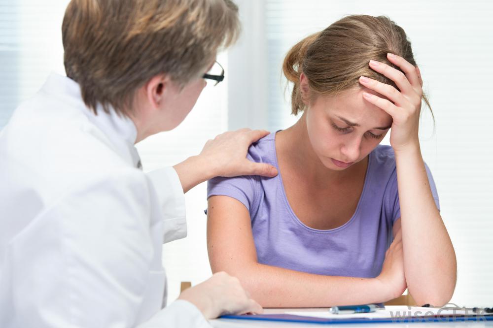 doctor-talking-to-a-sad-patient doctor-talking-to-a-sad-patient